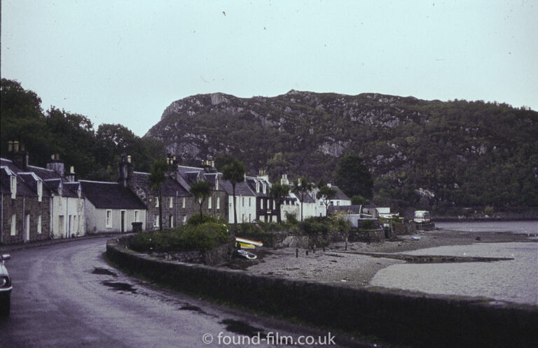 Unknown seaside town with seawall and theatre