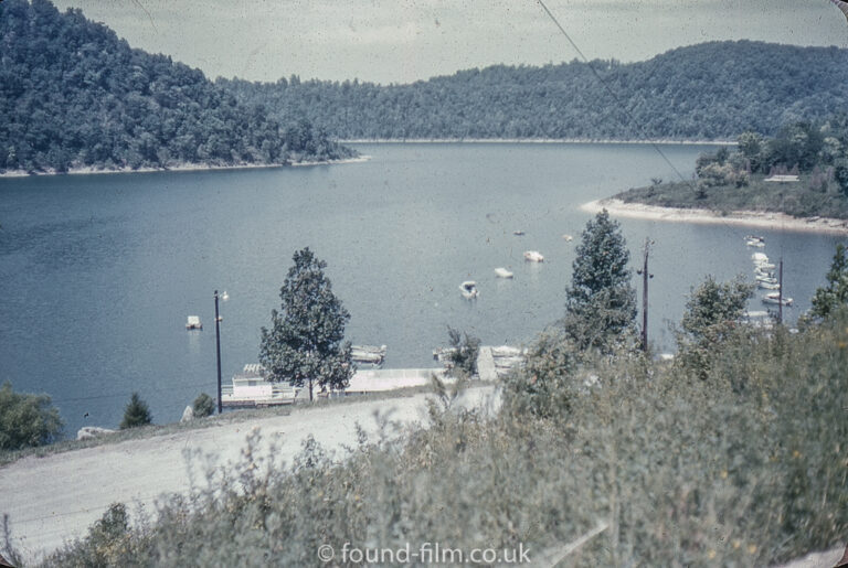 View over lake with mountains in background, Sept 1962