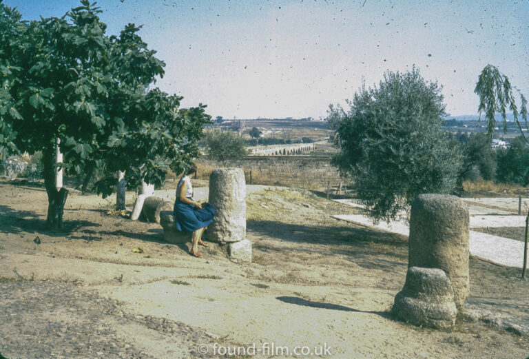 Woman by Stone pillars