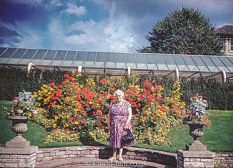 Posed picture of a woman in a public garden