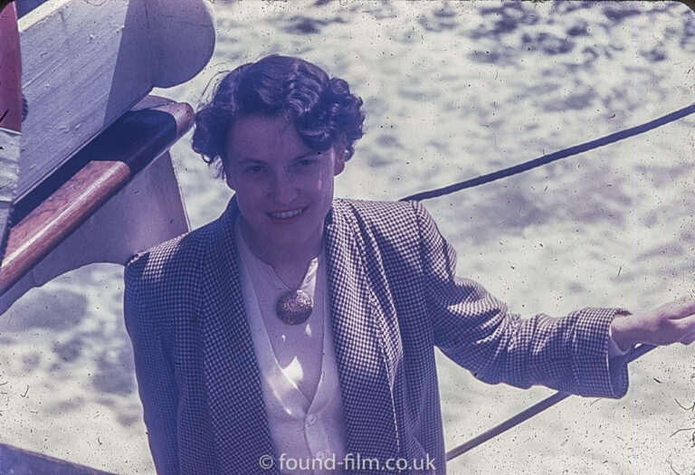 Woman in a Tweed jacket on a boat