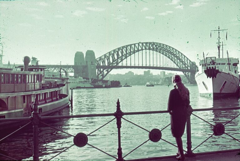 Woman looking out at Sydney Harbour bridge – c1959