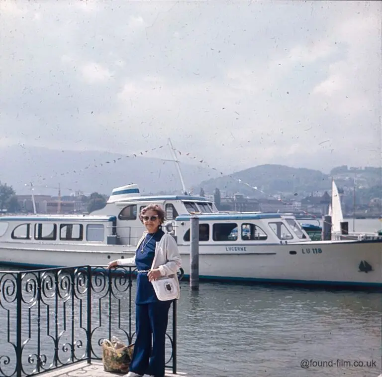 Woman standing by the lake in Lucern, Switzerland