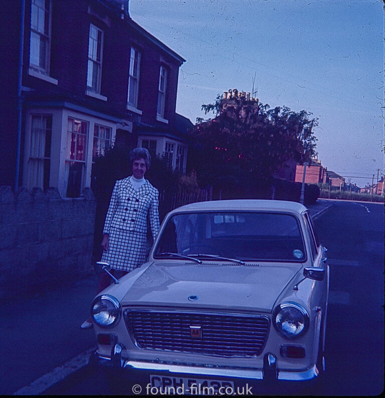 Woman with an Austin car c1967