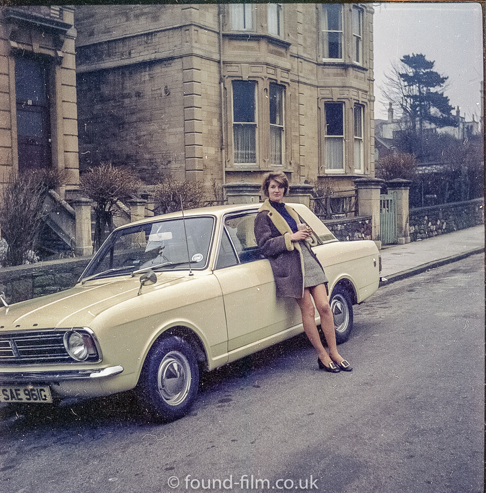 woman with ford cortina in the 1970s