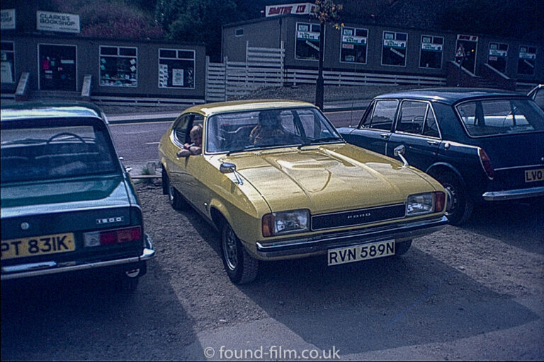 Yellow ford capri from 1974 parked in the street