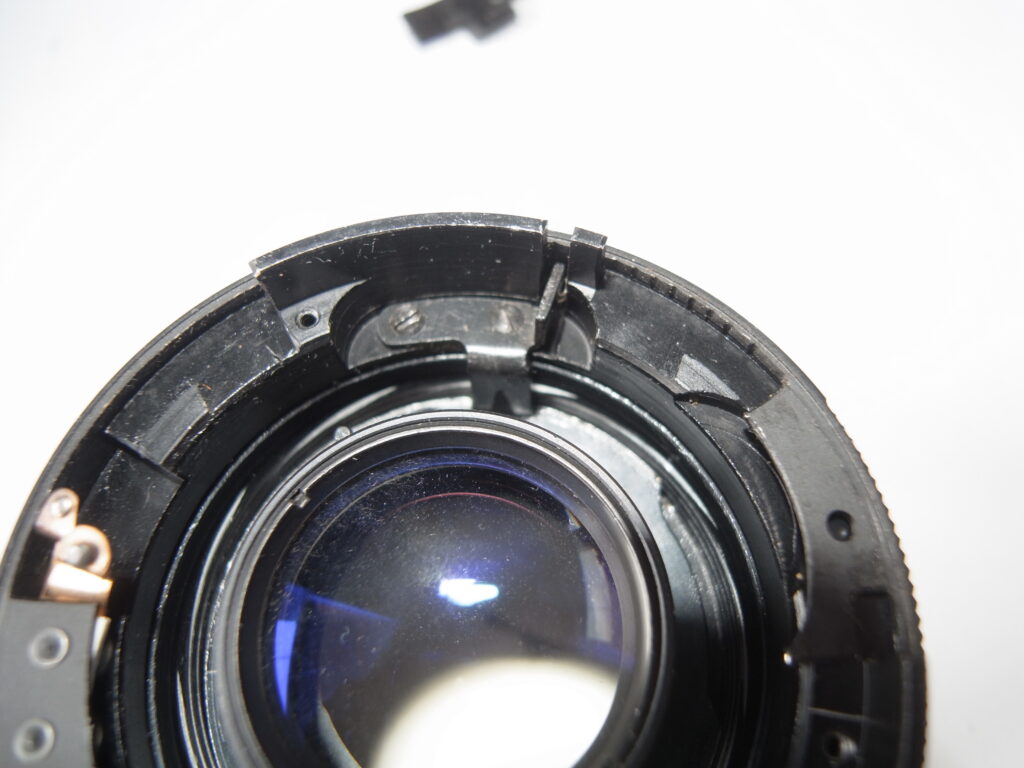 Pentacon 50mm strip down and clean - The lever needs to coincide with the slot