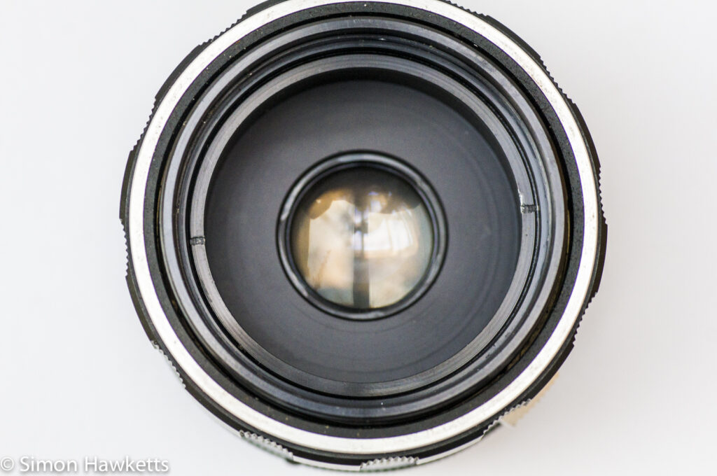Auto Miranda 50mm f/1.9 strip down and repair - front lens element removed exposing smaller retaining ring