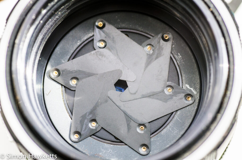 Auto Miranda 50mm f/1.9 strip down and repair - aperture set to f/16 showing oil contamination