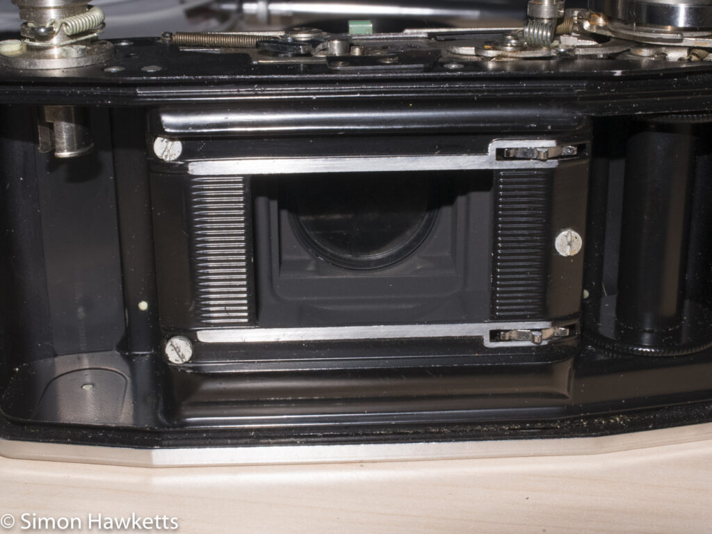 Agfa Ambi Silette shutter repair - film chamber with bolts revealed