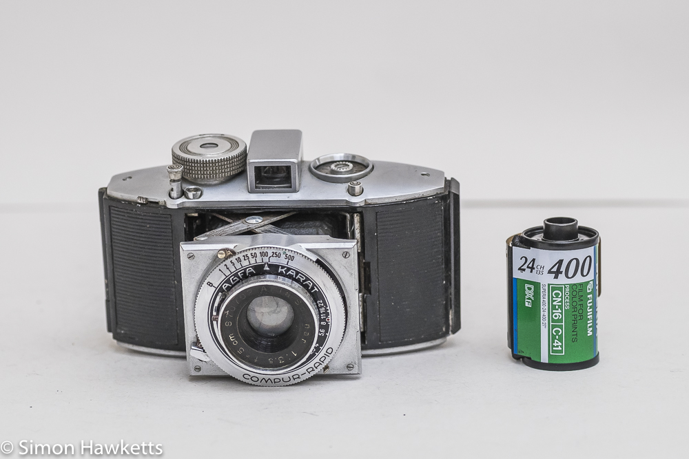 agfa karat viewfinder camera showing 35mm film for size comparison
