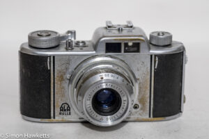 Aka Relle 35mm interchangeable lens viewfinder camera - front view of rather battered camera