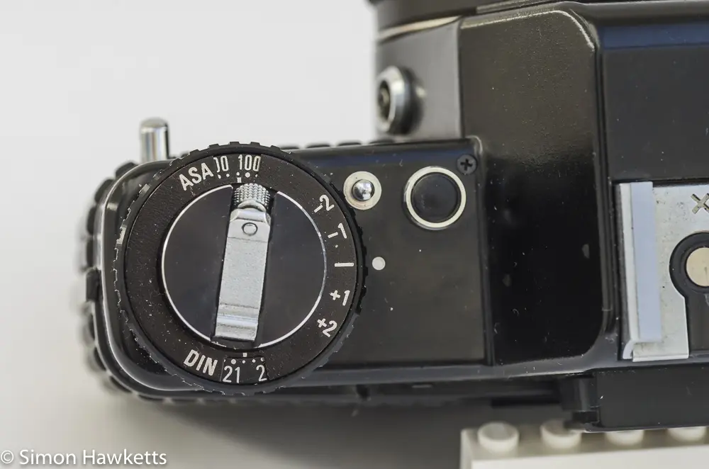 Detail shot of Praktica B200 film speed dial, exposure compensation and exposure lock button