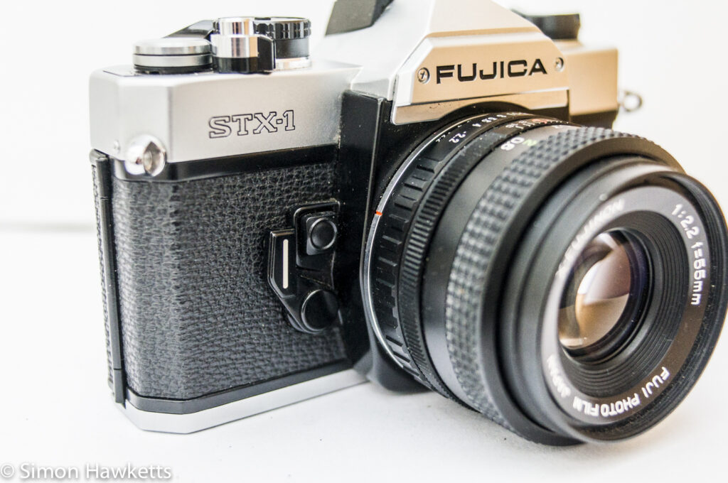 fuji stx 1 35mm slr side view showing self timer and depth of field preview