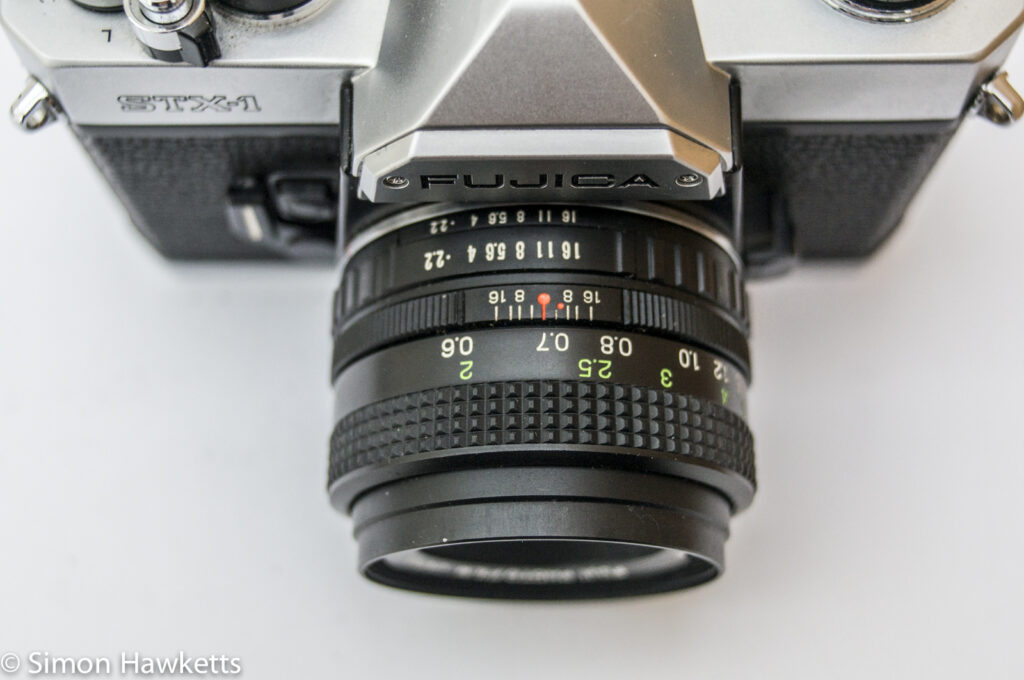 fuji stx 1 35mm slr top view showing lens aperture focus