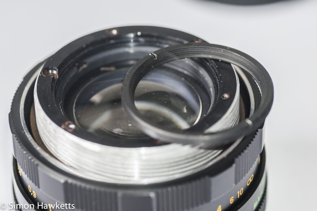 Helios 44M focus thread cleanup -  lens fitting removed front element ring