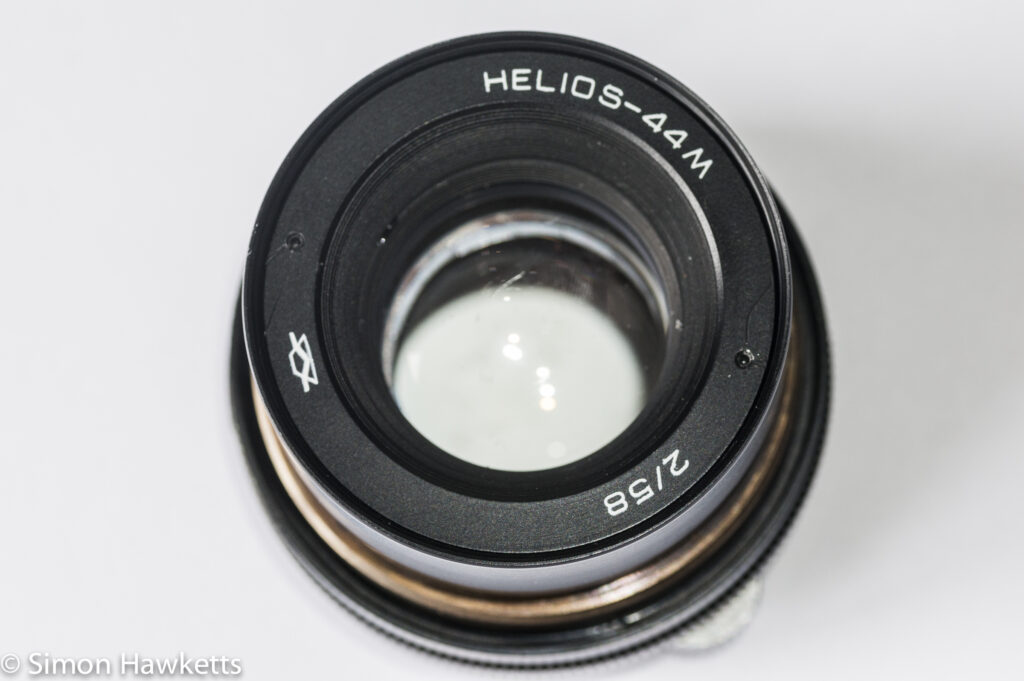 Helios 44M focus thread cleanup -  lens unscrewing the name plate