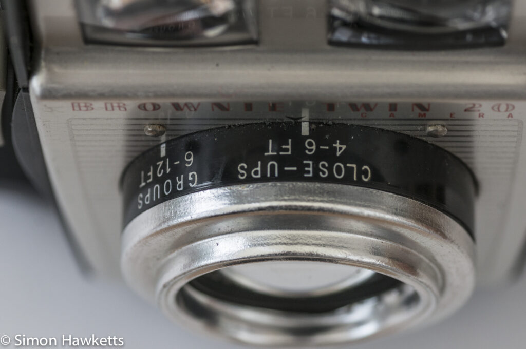Kodak Brownie Twin 20 roll film camera showing focus adjustment