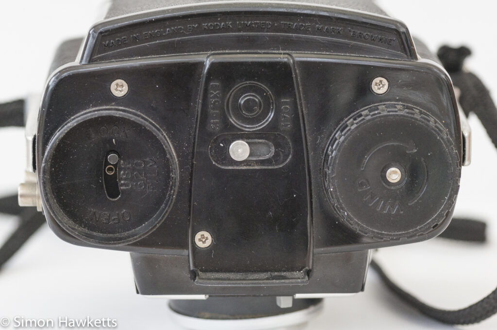 Kodak Brownie Twin 20 roll film camera showing the bottom of the camera with lock