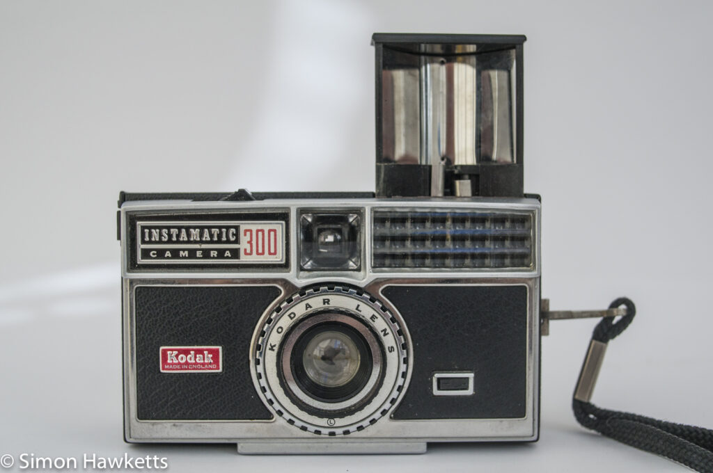 Kodak Instamatic 300 126 film camera showing flash open