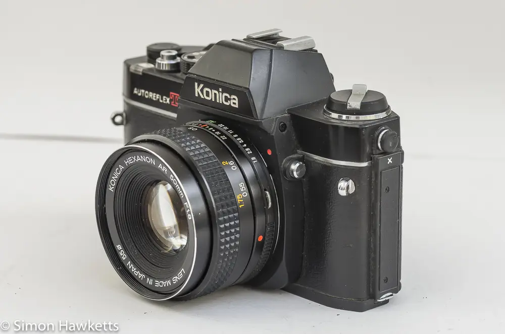 Konica Autoreflex TC side view showing lens release and X sync socket