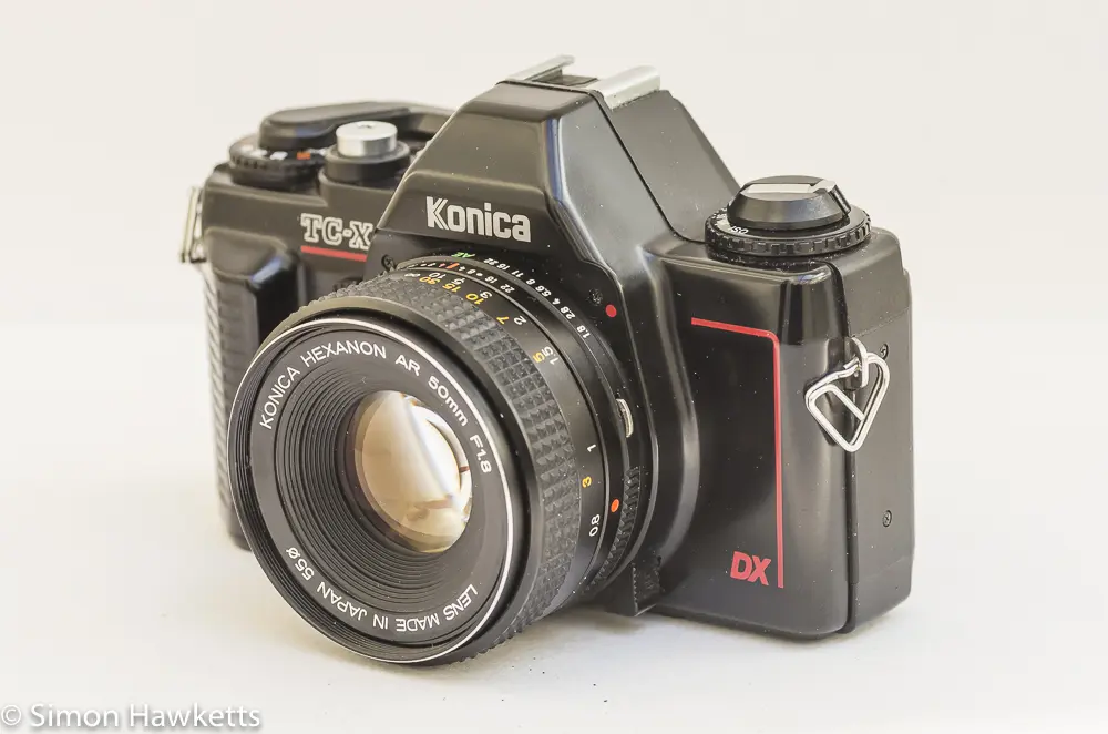 Konica TC-X DX side view showing lens release and AE lock release