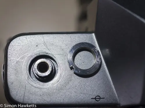 Kowa SE 35mm slr strip down - removing threaded nut under rewinded crank