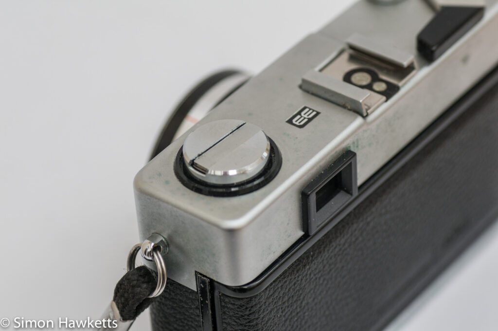 Mamiya 135 EE 35mm rangefinder camera showing rewind, hot shoe and viewfinder