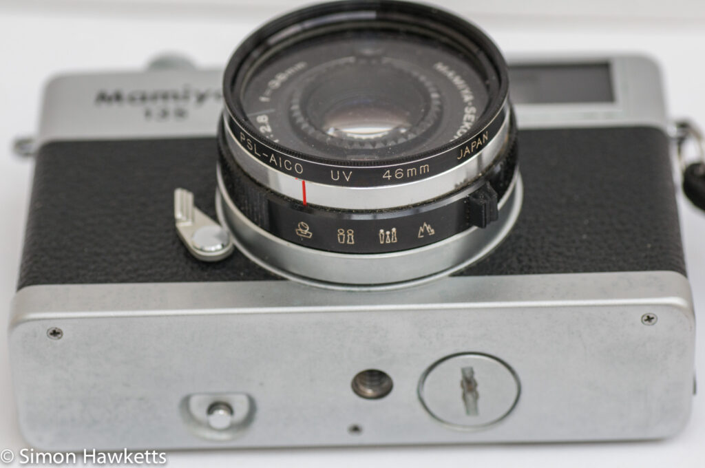 Mamiya 135 EE 35mm rangefinder camera showing self timer and battery compartment
