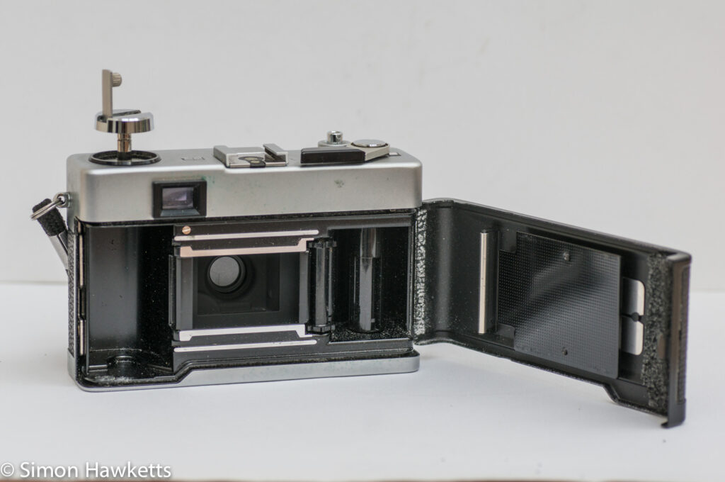 Mamiya 135 EE 35mm rangefinder camera showing the film chamber