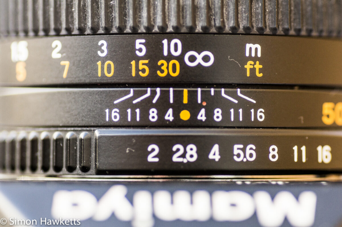 Mamiya ZM Quartz 35mm slr camera showing depth of field and aperture