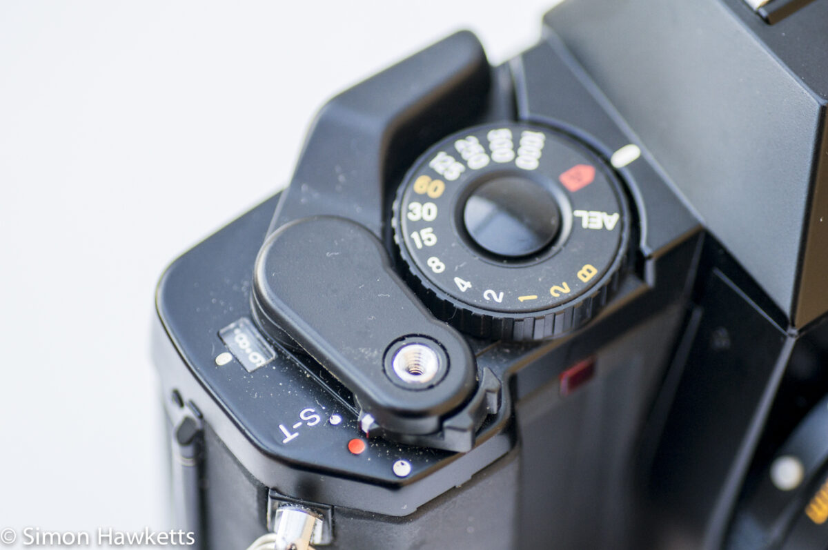 Mamiya ZM Quartz 35mm slr camera showing on/off switch and film advance