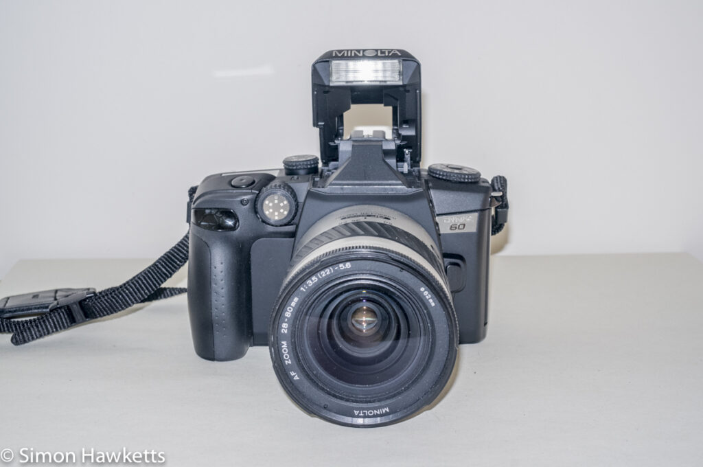 Minolta Dynax 60 SLR - Front view with flash raised
