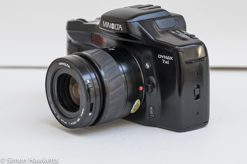 Minolta Dynax 7xi 35mm autofocus slr - Side view showing flash, auto/manual focus and lens release