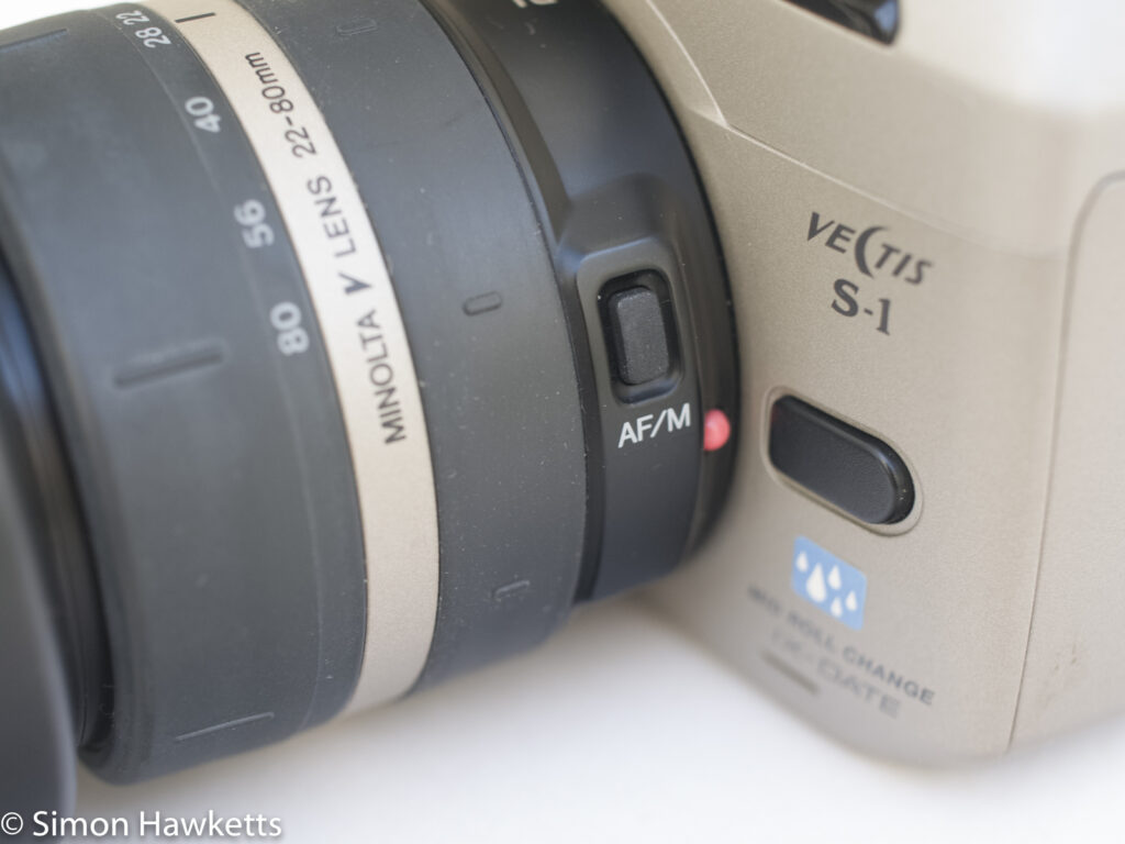 Minolta Vectis S-1 APS camera showing auto/manual focus switch