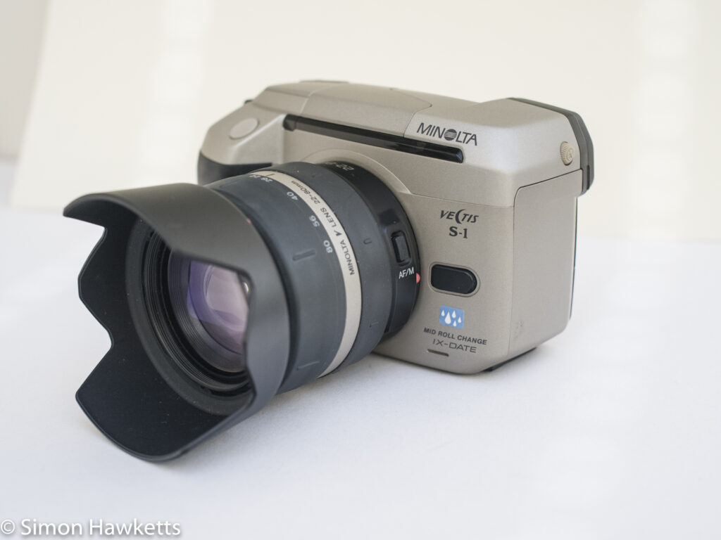 Minolta Vectis S-1 APS camera showing lens release button
