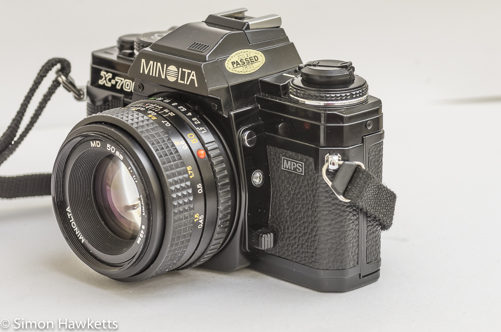 Minolta X-700 35mm slr side view of lens release and DOF preview