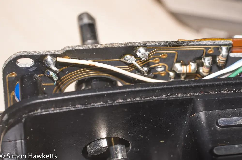 minolta xg m repair removed the bodies of the old capacitors