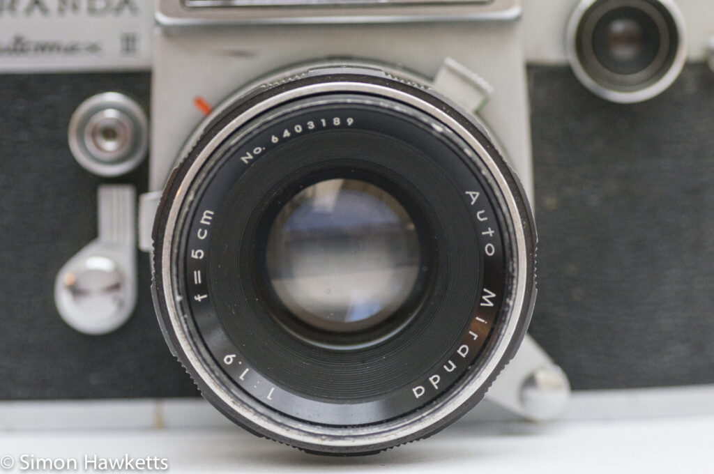 Miranda Automex III 35mm SLR camera showing auto miranda 50mm f/1.9 lens