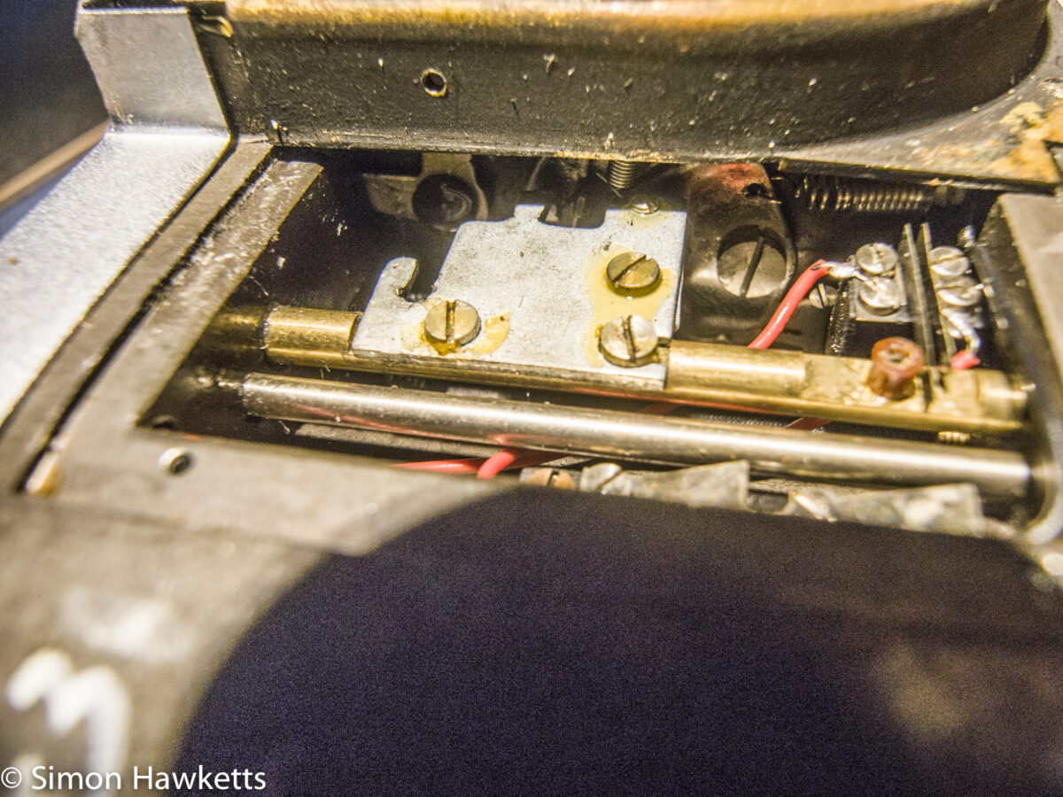 Miranda D-r shutter repair showing internal mechanism under front panel