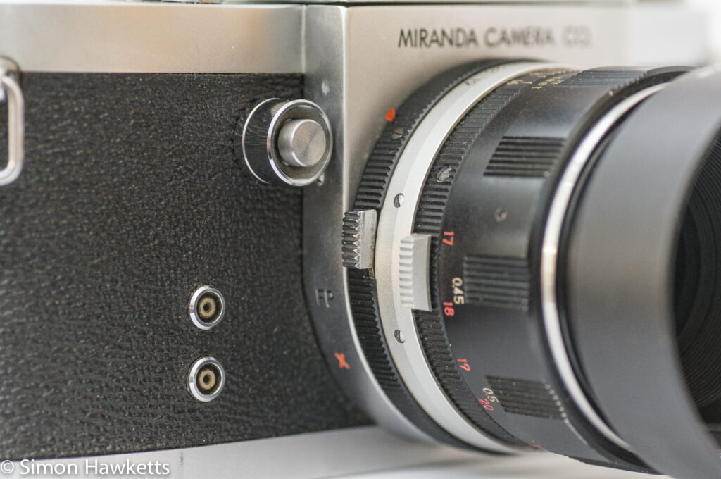 Miranda Fm 35mm slr camera showing lens lock, front release and flash sync sockets