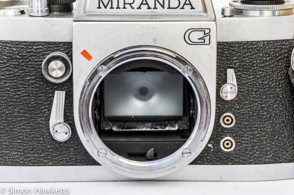 Miranda G 35mm slr camera showing mirror lockup with mirror down