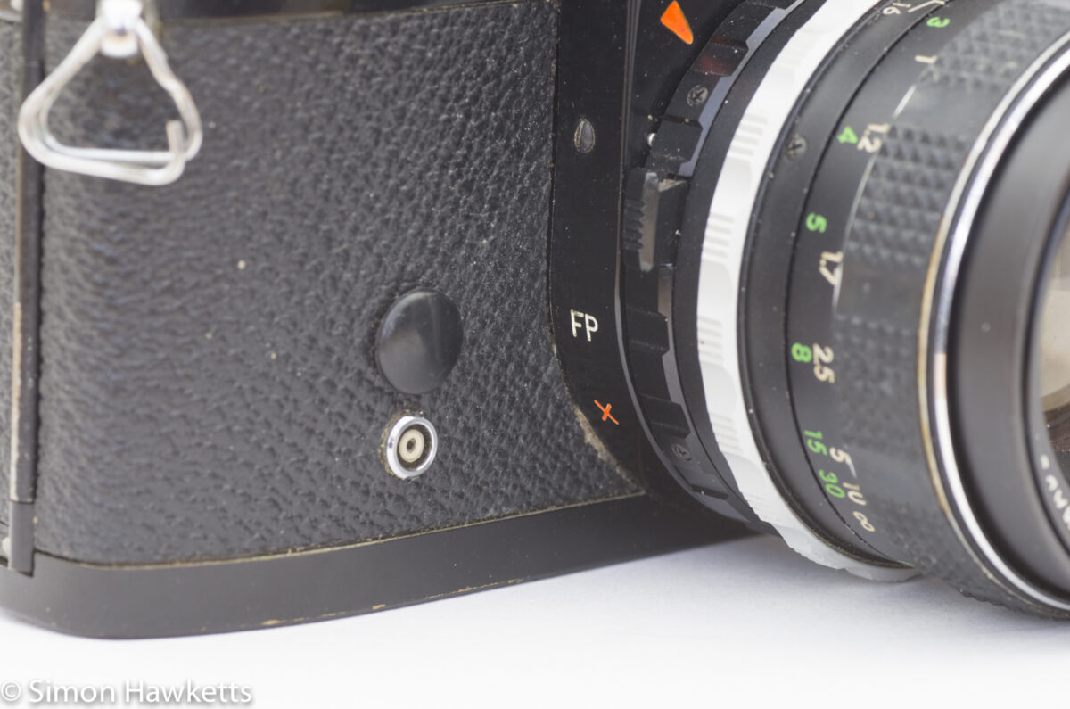 Miranda Sensomat RE-II 35mm slr - flash sync socket with missing cap
