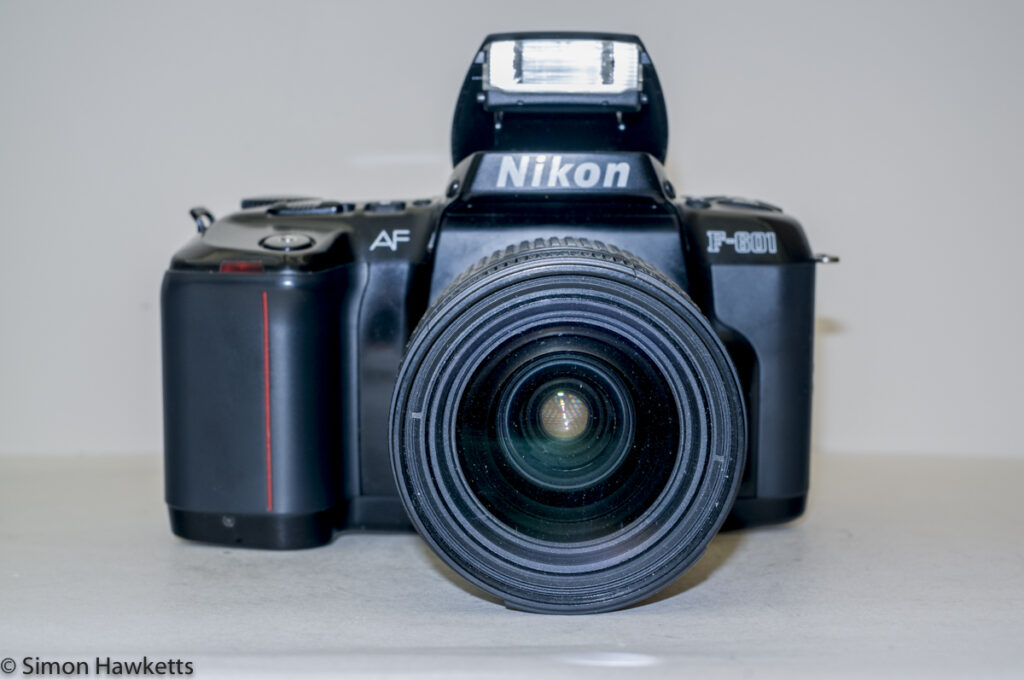 Nikon F-601 autofocus SLR - Front view with flash up