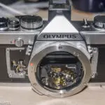 Olympus OM-1n re-assembly - Top cover fitted, just waiting for the camera covering to be replaced