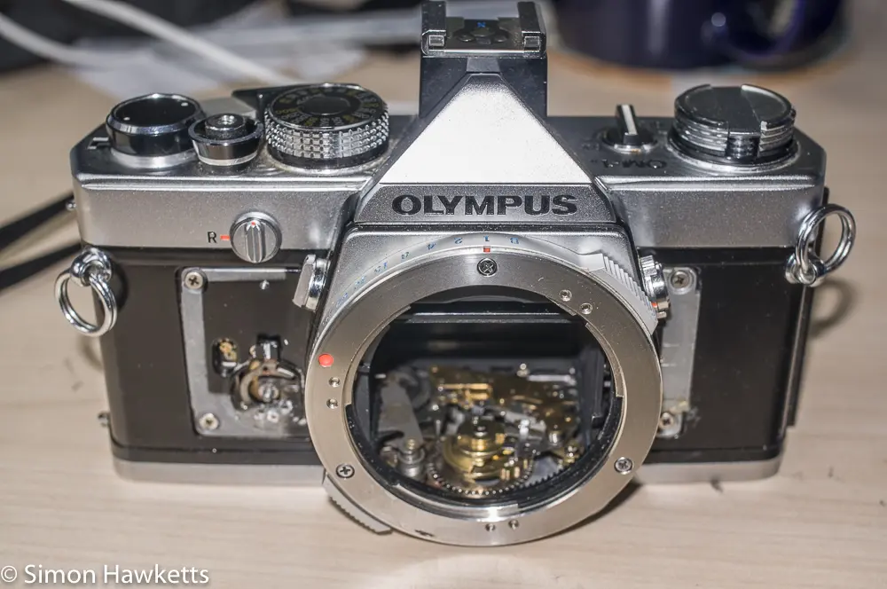 Olympus OM-1n re-assembly - Top cover fitted, just waiting for the camera covering to be replaced