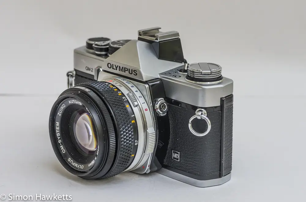 olympus om 2 35mm slr side view showing flash sync socket and switch