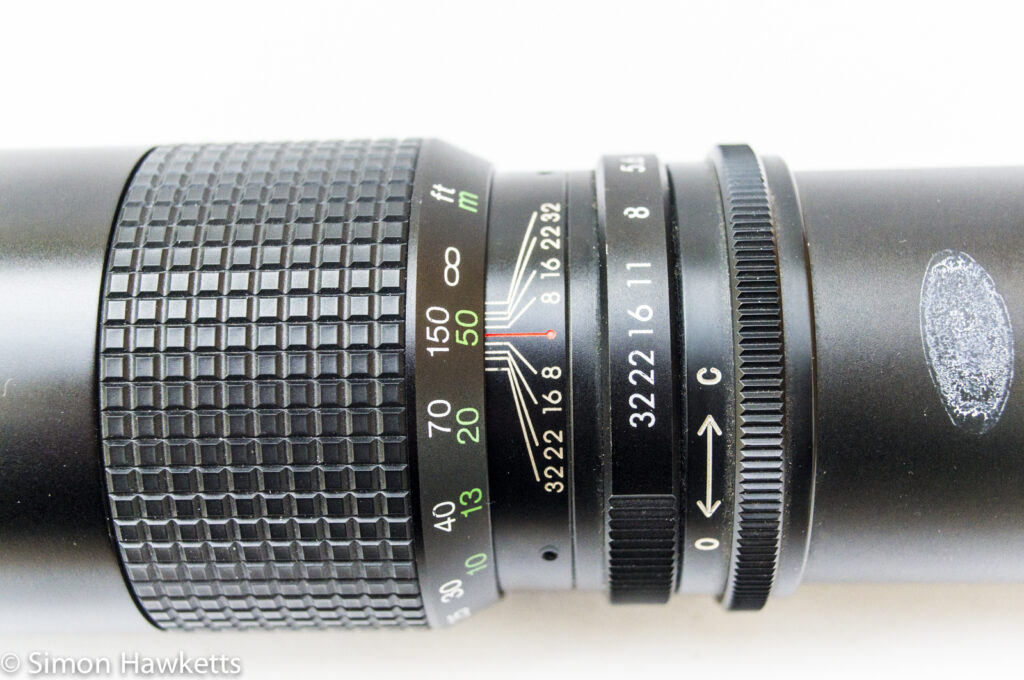 Optomax 300mm f/5.6 showing focus and aperture adjustment