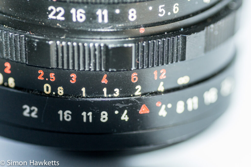 pentacon 30mm f 3 5 pre set lens showing focus depth of field scale