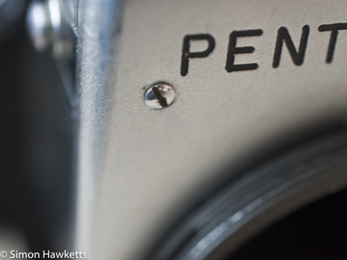 Pentacon six - removing the front plate screw
